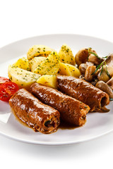 Wrapped pork chop with boiled potatoes