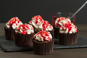 Halloween Cupcakes. Blood Topping, Whipped Cream, Chocolate. Home Baked.