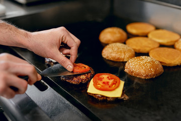 Cooking Burgers.  Meat And Buns Roasting On Grill 