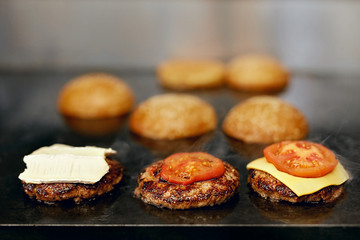 Cooking Burgers.  Meat And Buns Roasting On Grill 