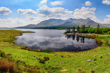 Quiet lake in Inagh valley, Connemara region in Ireland with Twelve Bens in the background