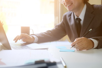 Business working with laptop computer and smile on face closeup shot photo.
