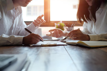 Consult business people meeting and planning finance data on wooden table and morning light.