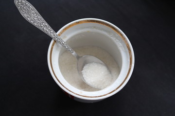 Fototapeta na wymiar Spoon with sugar