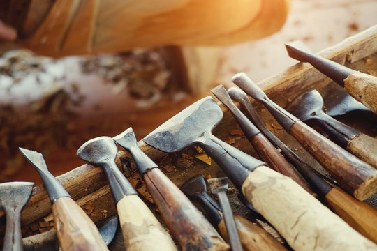 Wood  craft equipment object wood carve with a gouge on the workbench in carpentry.