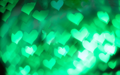 abstract background, neon green bokeh hearts