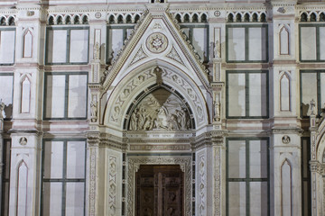 Close up of the doorway of Holy Cross church in Florence