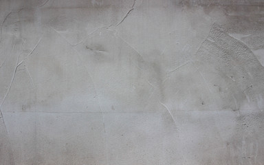gray textured concrete wall with crack, background, large view