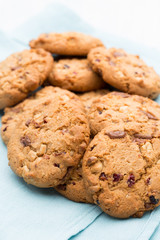 Chocolate oatmeal cookies on the  wooden background.