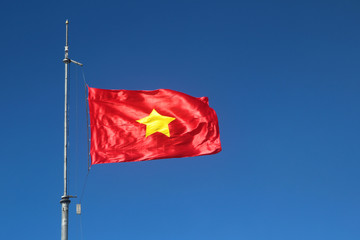 Vietnamese flag at the top of Fansipan mountain