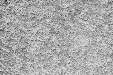 Grey plastered wall texture or background