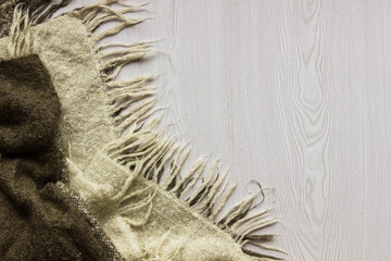 Warm and cozy brown and beige plaid. The texture of the fabric