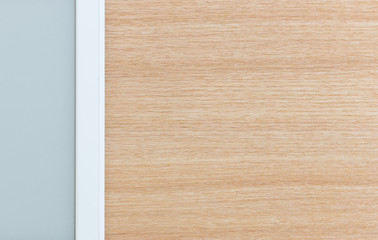 Lay Flat ebook reader on wooden surface