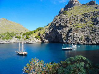 Yachts anchored in the beautiful Bay of Mallorca on a Sunny autumn day waiting for passengers