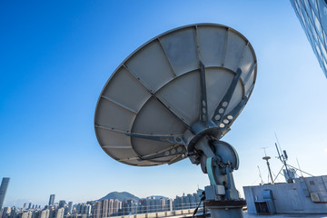 satellite dish antennas under sky