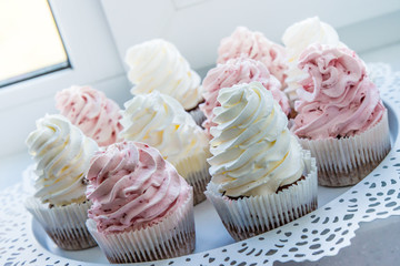 Tasty cupcakes on stand