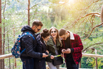 Four tourists trying to find the way