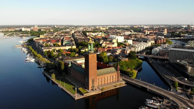 Aerial view panning in on the Stockholm City Hall "Stadshuset" and its surroundings.