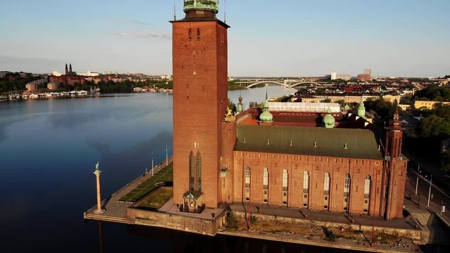 Aerial view and vertical panning of the Stockholm City Hall "Stadshuset" and its surroundings.