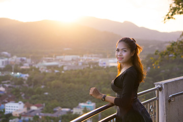 Bell portrait shooting in Rang Hill, Phuket, Thailand. She was capture with sunset background. This is a famous place sunset view point in Phuket city.