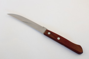 Knife  with wooden handle on a white background
