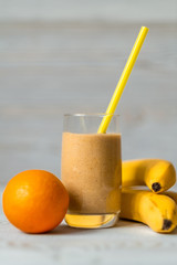 Fresh smoothies from bananas and orange