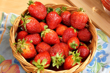 Bright fresh strawberry in a round container