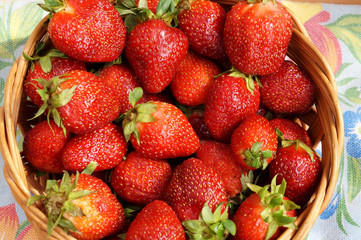 Bright fresh strawberry in a round container