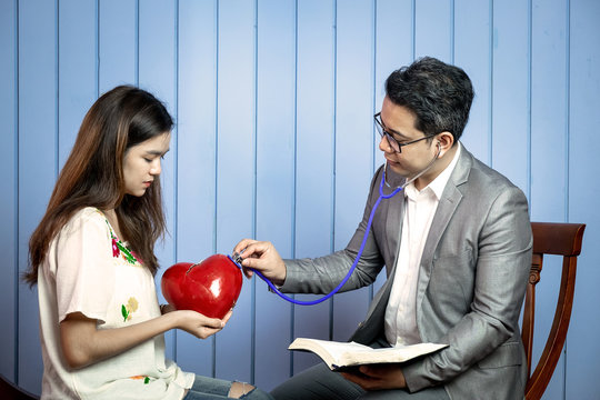 Asian Pastor Listen to Young Sad Beautiful Girl with Her Broken Heart, Healing from the Words of God.