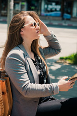 Fototapeta premium Young Business Girl Holding His Smart Phone