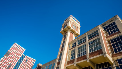 In the center of the Dutch city of Almelo, in the eastern part of the Netherlands near the Germany, there are two towers of an old steam mill that now is transformed to a business- and health center