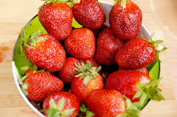 Bright fresh strawberry in a round container