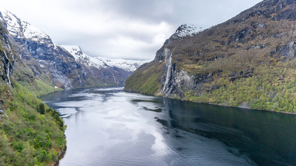 Fototapeta na wymiar Geirangerfjord with the Seven Sisters waterfall in the background