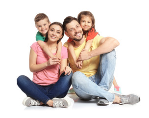 Happy family with cute children on white background