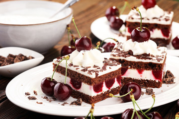 Chocolate cake with cherries and whipped cream. Black Forest cake
