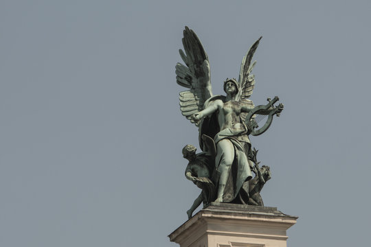 bronze sculpture genius with wings on the roof of the opera house in Lvov