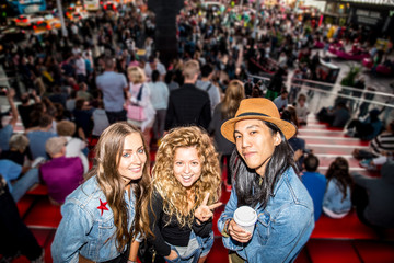 Friends taking selfie in Times Square