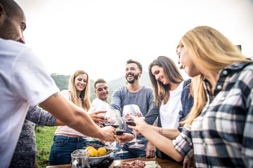 Friends having dinner in garden