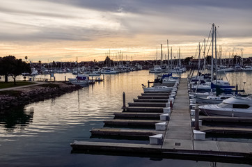 Obraz premium Many boats on marina during sunrise in Oxnard, California