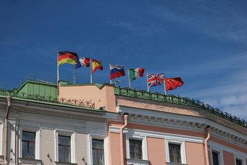 Fototapeta na wymiar Flags on the roof