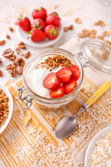 Glass jar of oat granola