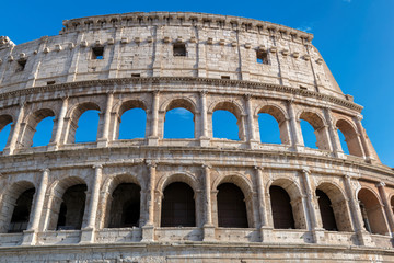 Obraz premium Colosseum in Rome, Italy. Roman Colosseum is one of the main travel attractions. Colosseum in the sunlight. Scenic view of Colosseum close-up.