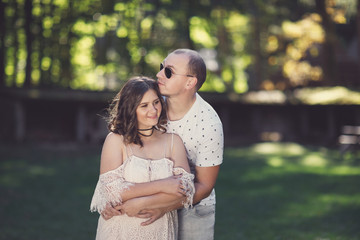Happy couple on vacation. Lovers enjoy each other in the summer 