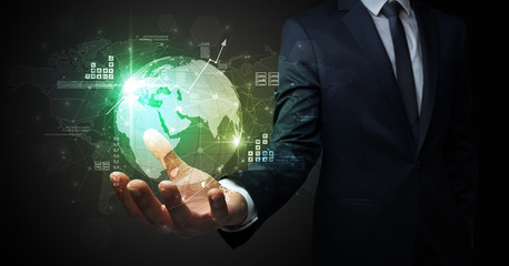 Businessman handing transparent global information flow concept on his hand