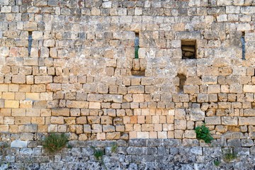 old stone wall of fortress