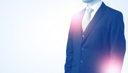 Young businessman standing and thinking without head  