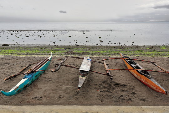 Traditional Filipino bangka outrigger fishing boats. Dumaguete-Negros Oriental-Philippines. 0498