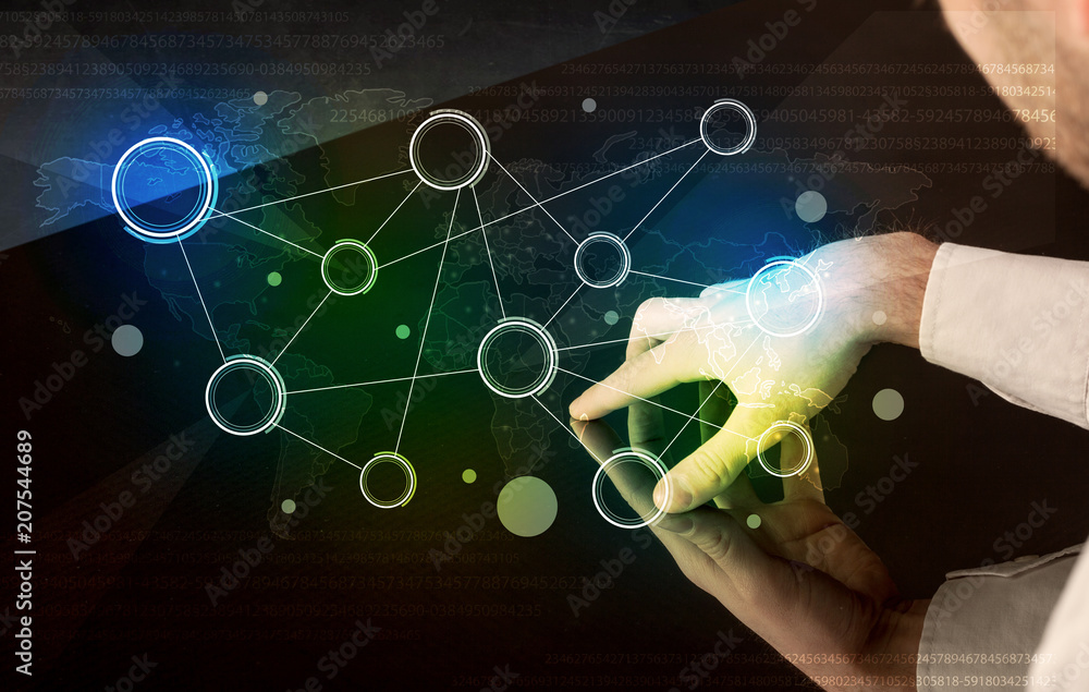 Poster Male hands touching interactive table with colorful world map on it 