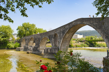 Fototapeta premium The famous stone bridge of Arta, in Epirus region, in Greece. It is the most legendary stone bridge in Greece.