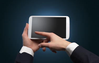 Hand using tablet with no concept and empty space
